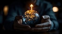 Businessman holding glowing Earth globe with golden arrow pointing upward symbolizing global growth, success and future opportunities in corporate environment.