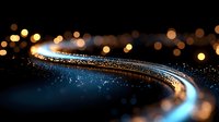 Elegant curved light trail with sparkling particles and warm bokeh lights creating magical flowing motion against dark background for luxury designs.