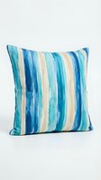 Striped throw pillow with vertical watercolor bands in shades of turquoise, navy, and cream on white background, isolated for home decor and interior design projects.