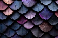 Textured scales pattern in dark moody colors with purple and pink accents creates dramatic abstract background. Overlapping curved shapes with rough surface detail.