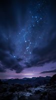 Orion constellation glowing above mountain landscape at night with connected star patterns and dramatic cloudy sky for astronomy and stargazing content.