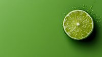 Fresh lime slice with water drops on vibrant green background, minimalist food composition with dramatic lighting and copy space for menu design or advertising.