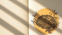 Decorative mandala brain design with floral elements on warm golden circle background for wellness and mindfulness projects.