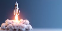 Rocket launch with dramatic smoke and fire effects against blue sky background, illustrating space exploration, startup concept and business growth metaphor.