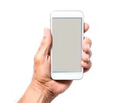 Male hand holding modern white smartphone with blank screen isolated on white background, mockup for app or web design presentation.