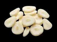 Dried white fig slices pile isolated on transparent background, ready for food packaging, stickers, print on demand, T-shirt design, and clipart use.