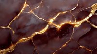 Dark burgundy marble surface with dramatic golden veins and cracks creating luxurious natural stone texture for elegant interior design and decoration projects.
