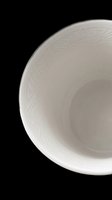 White ceramic bowl with embossed geometric pattern, isolated on transparent background, ready for use in product mockups, menus, clipart, and print on demand designs.