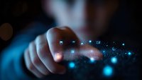 Finger touching digital interface with glowing blue icons and particles floating in dark space, representing modern technology interaction and data control.