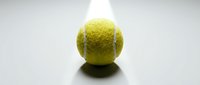 Yellow tennis ball isolated on white background, ready for sports design projects, marketing materials, and athletic promotional content.