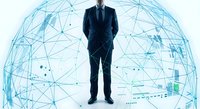 Professional businessman in dark suit standing confidently within glowing blue digital network sphere representing global connectivity and technology solutions.