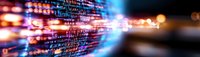Abstract digital data stream with glowing light trails and bokeh effects in blue and orange colors creating futuristic technology background for digital concepts.