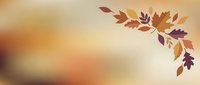 Autumn leaves branch with warm orange and burgundy foliage on soft gradient background for seasonal designs and fall decorations.