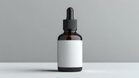 Brown glass dropper bottle with blank white label on gray background, isolated product mockup for pharmaceutical, cosmetic or essential oil packaging design.