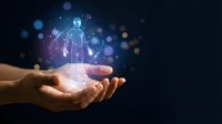 Human hands holding glowing digital human figure with network connections and light effects on dark background for technology and innovation concepts.