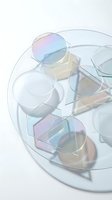 Transparent glass containers with iridescent holographic coatings arranged on a circular tray, featuring soft pastel reflections and minimalist aesthetic for modern product display and packaging design.