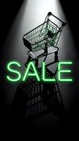 Shopping cart under dramatic spotlight with glowing green neon SALE text on dark background, perfect for retail promotions and discount campaigns.