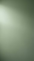 Soft sage green gradient background with subtle light leak effect, suitable for design overlays and creative projects.