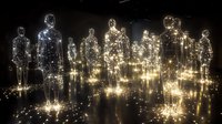 Glowing luminous human figures standing in darkness, radiating light particles and creating ethereal atmosphere. Artistic visualization of spiritual energy and consciousness.