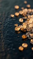Golden amber crystals scattered on dark textured surface with selective focus, suitable for luxury, jewelry, cosmetics, and wellness product backgrounds.