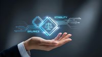 Businessman hand holding glowing neon balance scale with stability and balance text, representing financial equilibrium, justice, and business ethics concepts for corporate presentations.