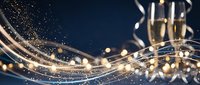 Elegant champagne splash with golden bubbles and flowing liquid creating dynamic waves against dark blue background for luxury celebration designs.