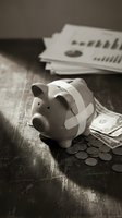 Broken piggy bank with bandage surrounded by coins and dollar bills representing financial recovery and budget repair concepts.