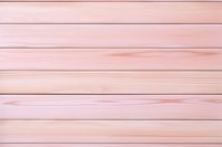 Soft pink wooden planks background with horizontal lines and natural wood grain texture. Rustic pastel surface for feminine product photography and design layouts.