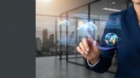 Businessman in dark suit touching digital globe and network icons with cityscape visible through office windows, representing global connectivity and international business technology solutions.