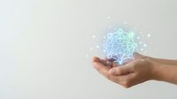 Hands holding glowing network connection with digital nodes and links representing technology, connectivity, and data transfer concepts.