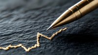 Gold luxury pen drawing ascending financial chart line on dark textured surface, representing business growth and investment success analysis.