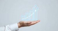 Business professional hand presenting holographic growth chart with upward arrow showing financial success and data analytics for corporate presentations.