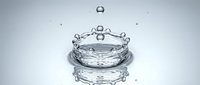 Water drop creating crown splash with ripples on reflective surface against clean white background for commercial design projects.