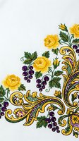 Ornate embroidered floral corner design with yellow roses, purple grapes and golden baroque scrollwork on white fabric background for luxury textile decoration.