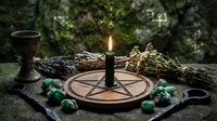 Mystical altar setup with pentagram, burning candle, herbs, crystals and chalice for spiritual rituals, witchcraft practices and esoteric ceremonies.