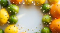 Colorful citrus fruits with water droplets on transparent background, isolated for design use on merchandise and promotional materials.