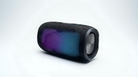 Portable wireless speaker with dynamic RGB lighting effects in purple and blue tones, isolated on white background, ready for product design and marketing use.