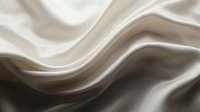 Smooth flowing waves of cream and charcoal create an elegant abstract composition with soft lighting and dimensional curves for luxury design projects.