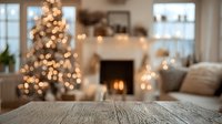 Rustic wooden table with blurred cozy Christmas living room background featuring decorated tree, fireplace, and warm bokeh lights.