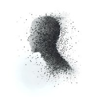 Male profile silhouette created from scattered black particles and dots on white background, dissolving effect suggests transformation or digital decay.