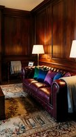 Elegant home office with dark wood paneling, burgundy leather sofa, colorful pillows and warm lighting creating sophisticated atmosphere.
