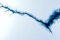Abstract blue watercolor crack on white background, resembling lightning or fractured ice pattern, artistic fluid texture for modern wall decor and design projects.