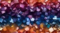 Colorful crystal geode macro photography showing gradient from pink to purple to blue to golden brown, natural mineral formation with sparkling facets.