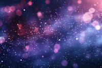 Dreamy purple and pink bokeh background with glowing particles and sparkles floating in dark space creates magical atmospheric effect.