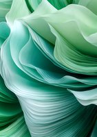 Flowing mint green fabric layers create elegant waves and curves, with soft translucent textures forming an abstract composition in emerald and seafoam tones.