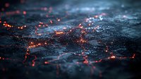 Glowing hot embers scattered across dark volcanic surface with orange sparks and smoke creating mysterious atmospheric background for dramatic designs.