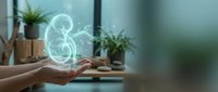 Hands holding glowing ampersand symbol in modern workspace with plants and laptop, representing connection and collaboration in digital business environment.
