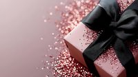 Pink gift box with elegant black satin bow on dark background with scattered rose gold glitter creating magical festive atmosphere for special occasions.