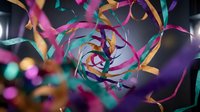 Colorful party streamers and confetti creating festive celebration atmosphere with vibrant ribbons swirling in motion against dark background for events.