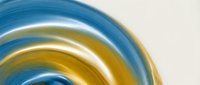 Smooth blue and gold swirling liquid waves with glossy finish on white background, isolated design element for modern graphics and branding projects.